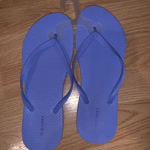 Light purple flip flops